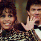 Whitney Houston receiving the award for Record of the Year for “I’ll Always Love You,” and Album of the Year for the soundtrack for the The Bodyguard in 1993.